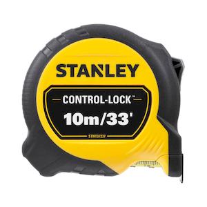 Рулетка вимірювальна CONTROL-LOCK довжиною 10 м/33, шириною 25 мм, в обгумованому корпусі, з подвійною шкалою STANLEY STHT37237-5 - картинка №5 Фото №5 - Рулетка вимірювальна CONTROL-LOCK довжиною 10 м/33, шириною 25 мм, в обгумованому корпусі, з подвійною шкалою STANLEY STHT37237-5