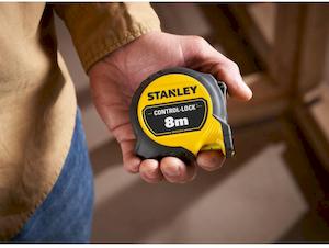 Рулетка вимірювальна CONTROL-LOCK довжиною 8 м, шириною 25 мм, в обгумованому корпусі, з подвійною шкалою STANLEY STHT37240-3 - картинка №5 Фото №5 - Рулетка вимірювальна CONTROL-LOCK довжиною 8 м, шириною 25 мм, в обгумованому корпусі, з подвійною шкалою STANLEY STHT37240-3